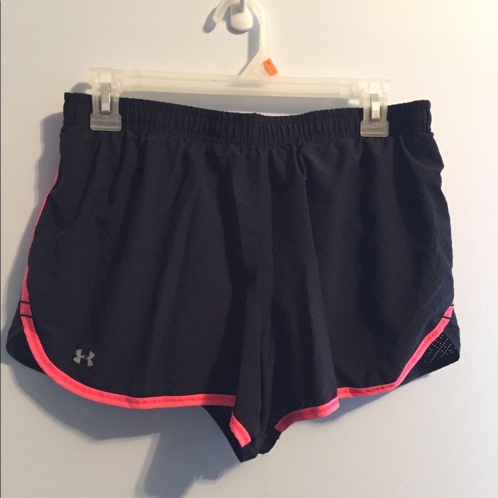 Black running shorts with pink detailing